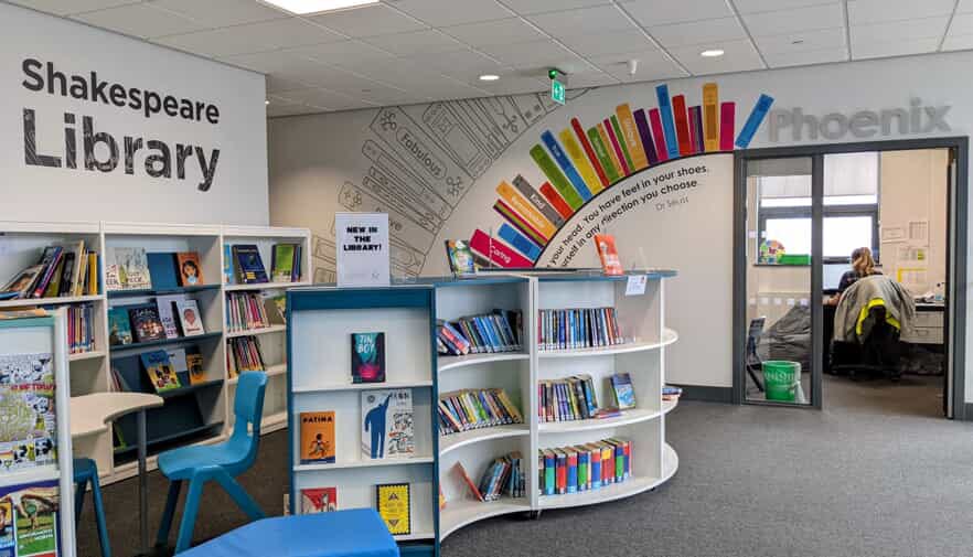An image of the Shakespeare Library graphics, which look like curved, full bookshelves.